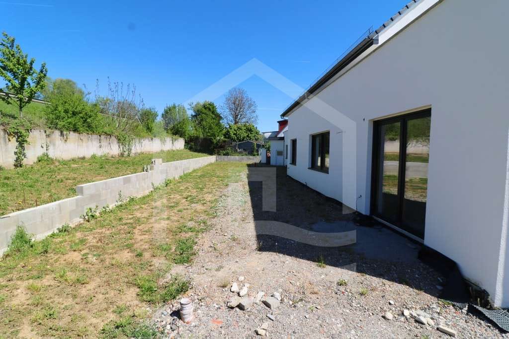 Immobilie in Helmstadt-Bargen - Preis-Leistungs-Hit! Exklusiver Neubau mit großzügiger Einliegerwohnung - Bild 2