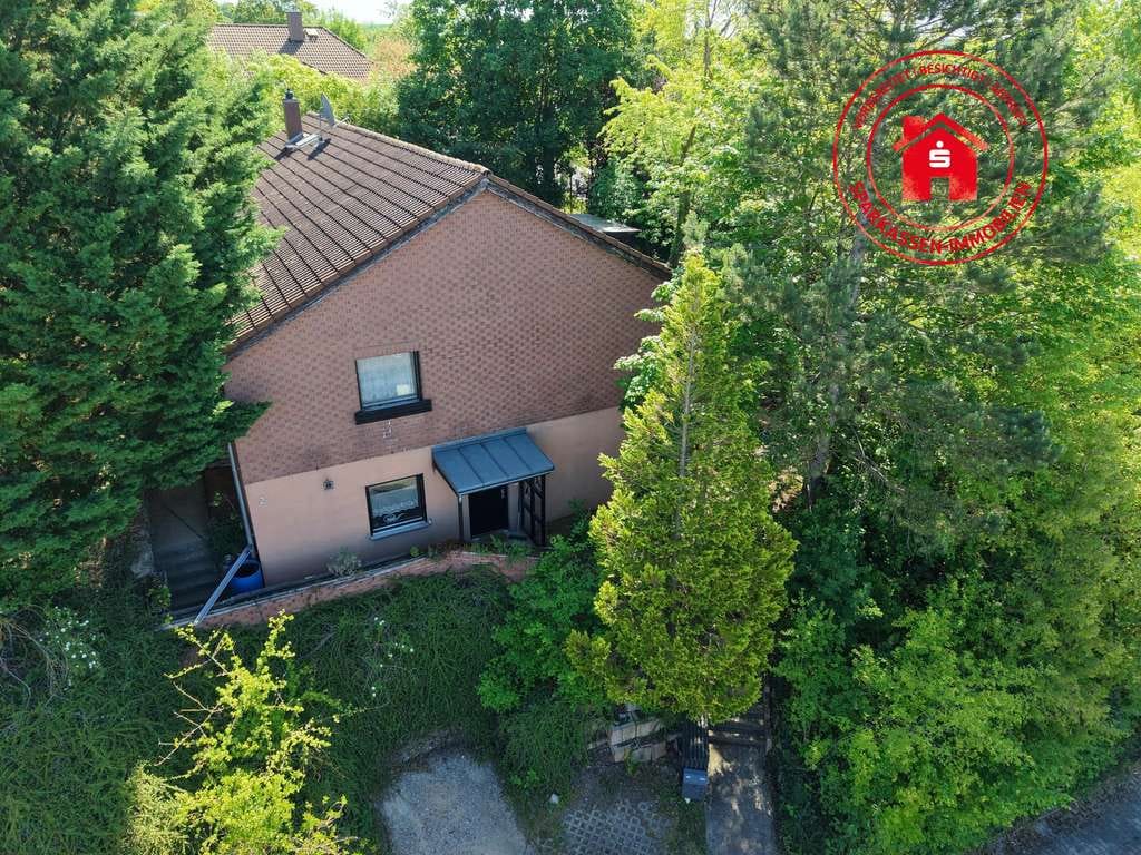 Immobilie in Grünsfeld - Charmantes Einfamilienhaus mit separater Einliegerwohnung in gefragter Lage von Grünsfeld
 - Bild 0