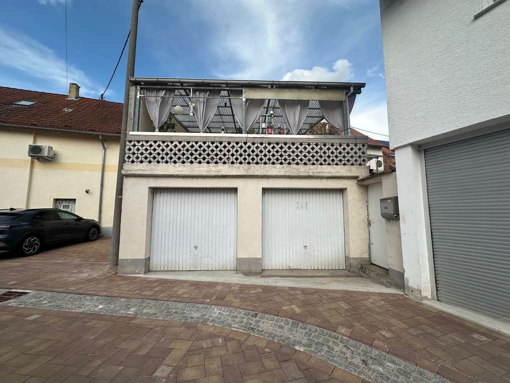 Immobilie in Gensingen - Zwei Wohneinheiten, große Terrasse & Garagen– gepflegtes Mehrfamilienhaus - Bild 4