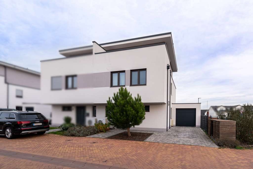 Immobilie in Braunweiler - Exklusive DHH mit hochwertiger Ausstattung und Dachterrasse mit Naturblick! - Bild 2