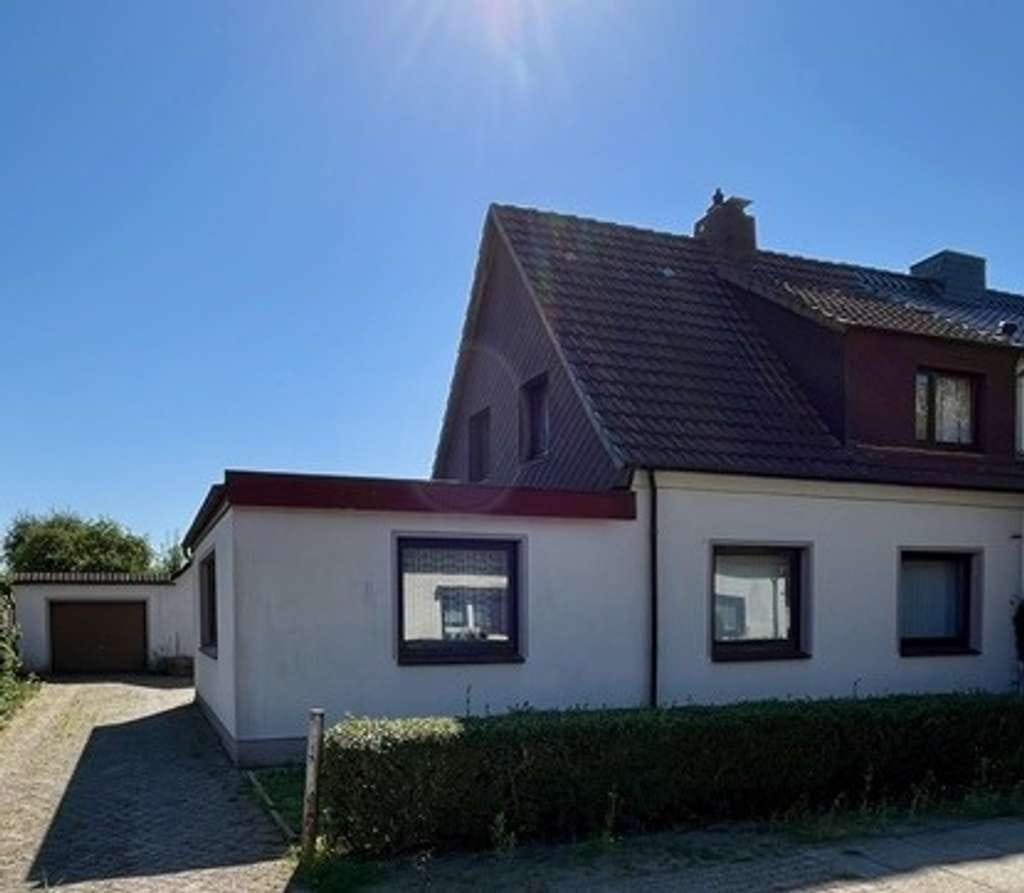Immobilie in Elsfleth - Gepflegte Doppelhaushälfte mit großem Grundstück – viel Platz und Potenzial für ihre Wohnideen! - Bild 0