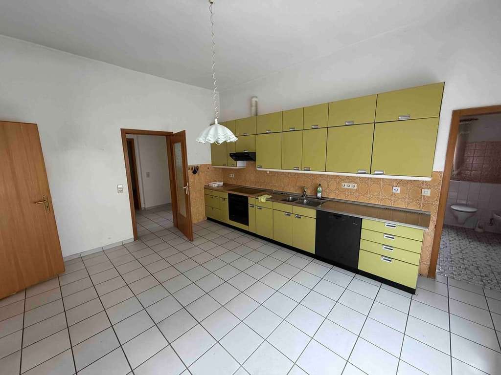 Immobilie in Ketsch - Gepflegtes Dreifamilienhaus in zentraler Lage von Ketsch - Bild 2