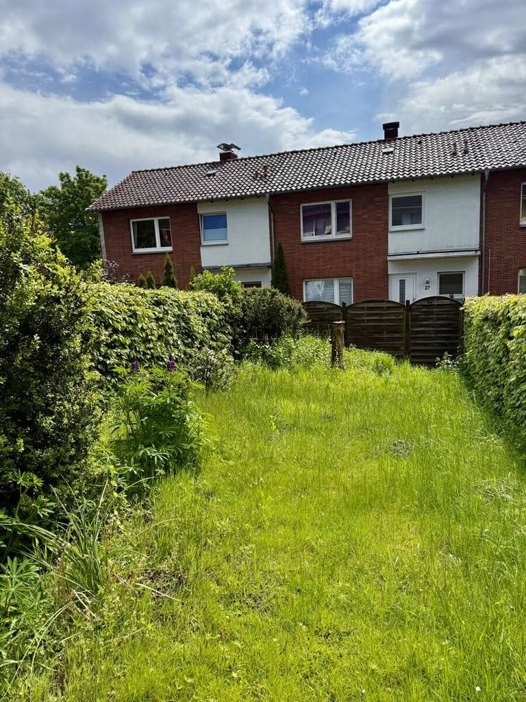 Immobilie in Borgholzhausen - Sanierungsbedürftiges Reihenmittelhaus mit kleinem Garten in beliebter Wohnlage von Borgholzhausen! - Bild 2