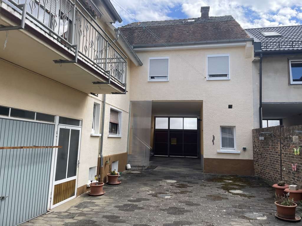 Immobilie in Ober-Mörlen - Wohnhaus mit großem Garten und Ausbaupotenzial - Bild 0