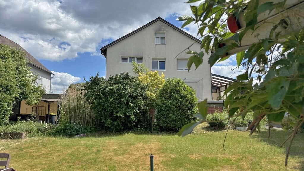 Immobilie in Limeshain - Mehrfamilienhaus mit 4 Wohneinheiten und  Ladenfläche - Bild 2