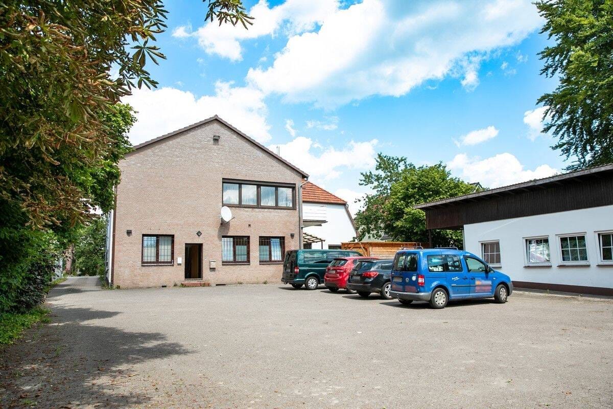 Immobilie in Ottersberg - Ottersberg | Wohn- und Geschäftshaus mit drei vermieteten Wohnungen und Gewerbefläche - Bild 4