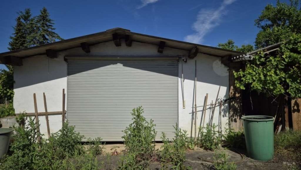 Immobilie in Karbach - Bungalow (sanierungsbedürftig) mit Bauplätzen  - Bild 2