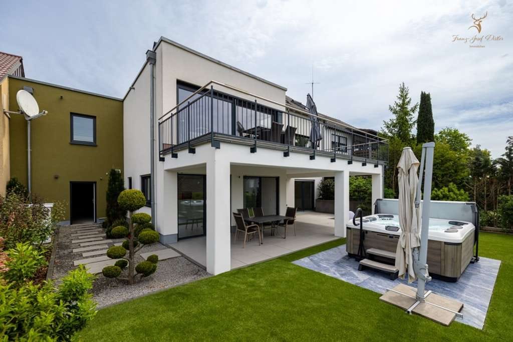 Immobilie in Helmstadt - Neuwertiges Einfamilienhaus mit Einliegerwohnung, Fußbodenheizung & Wärmepumpe - Bild 0