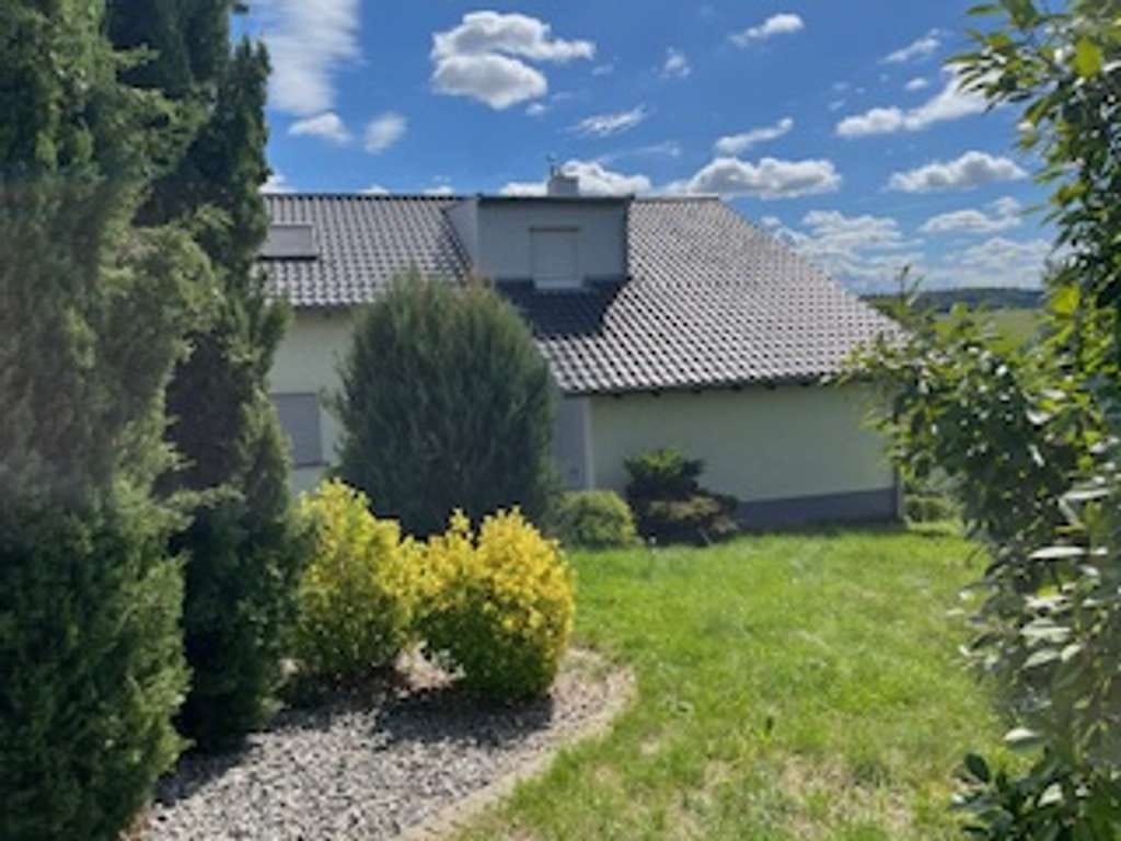 Immobilie in Östringen - Gepflegtes Ein-/Zweifamilienhaus in Östringen-Tiefenbach in bevorzugter Lage - Bild 1