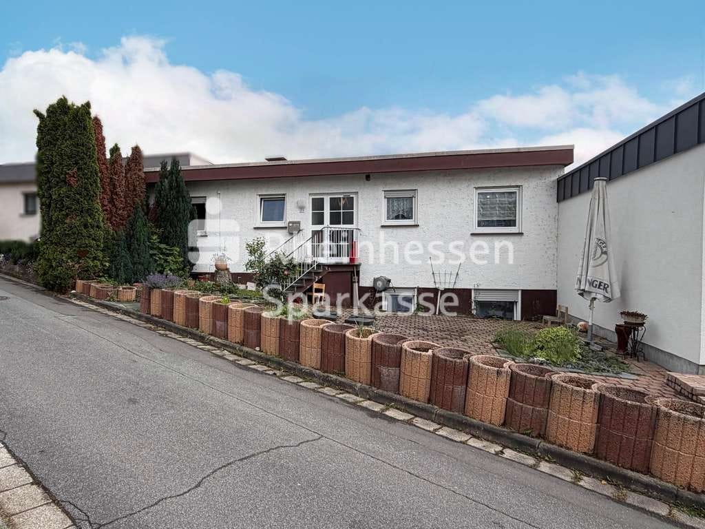 Immobilie in Nieder-Olm - Großzügiger Reihenmittelbungalow mit Einliegerwohnung in begehrter Lage! - Bild 0
