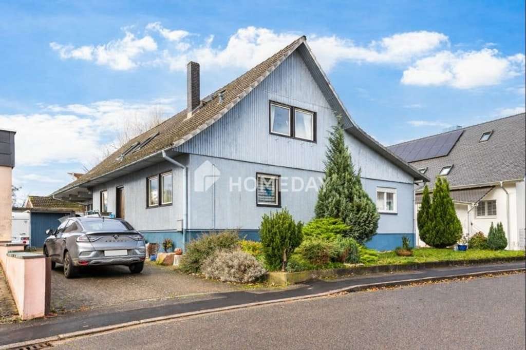 Immobilie in Kappel-Grafenhausen - Ihr neues Zuhause für die Familie: Großzügiges Haus mit Garten, Garagen und Gestaltungsspielraum - Bild 0