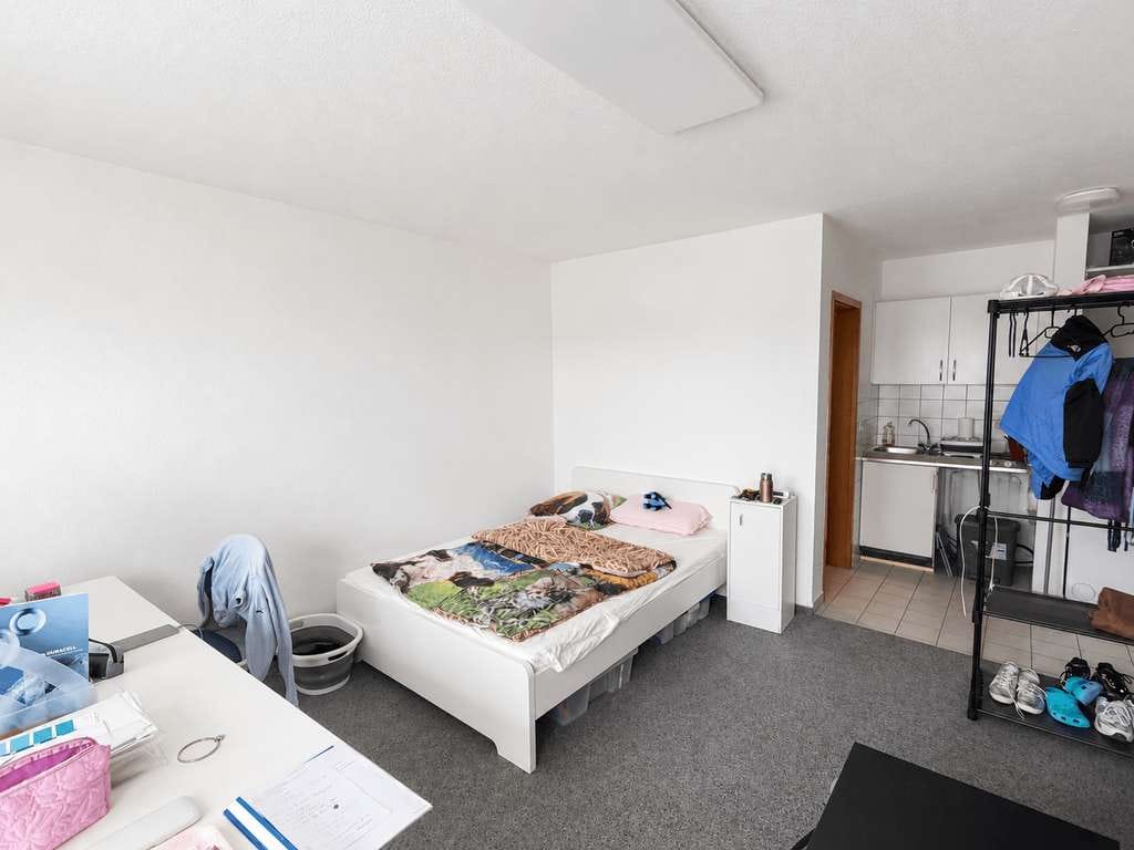 Immobilie in Dossenheim - Vermietete 1-Zimmer-Wohnung mit Balkon & 2 Stellplätzen - Bild 1