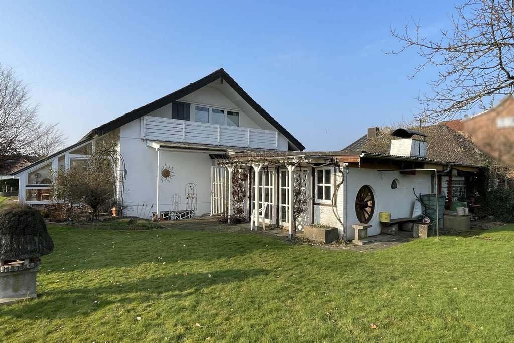 Immobilie in Zeven - Außergewöhnlicher Wintergarten und viel Platz für Ihre Wohnideen - Bild 4