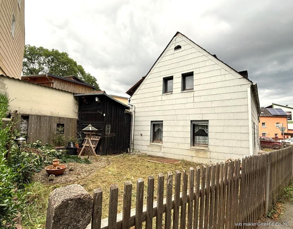 Immobilie in Hof - Charmantes Einfamilienhaus mit Garten in Hof. - Bild 1
