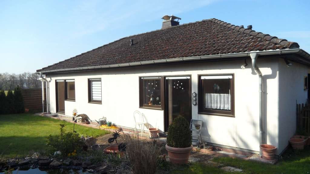 Immobilie in Münchwald - -- Charmanter Winkel-Bungalow mit Sonnenterrasse, Garten und Garage am Rande des Soonwaldes -- - Bild 0