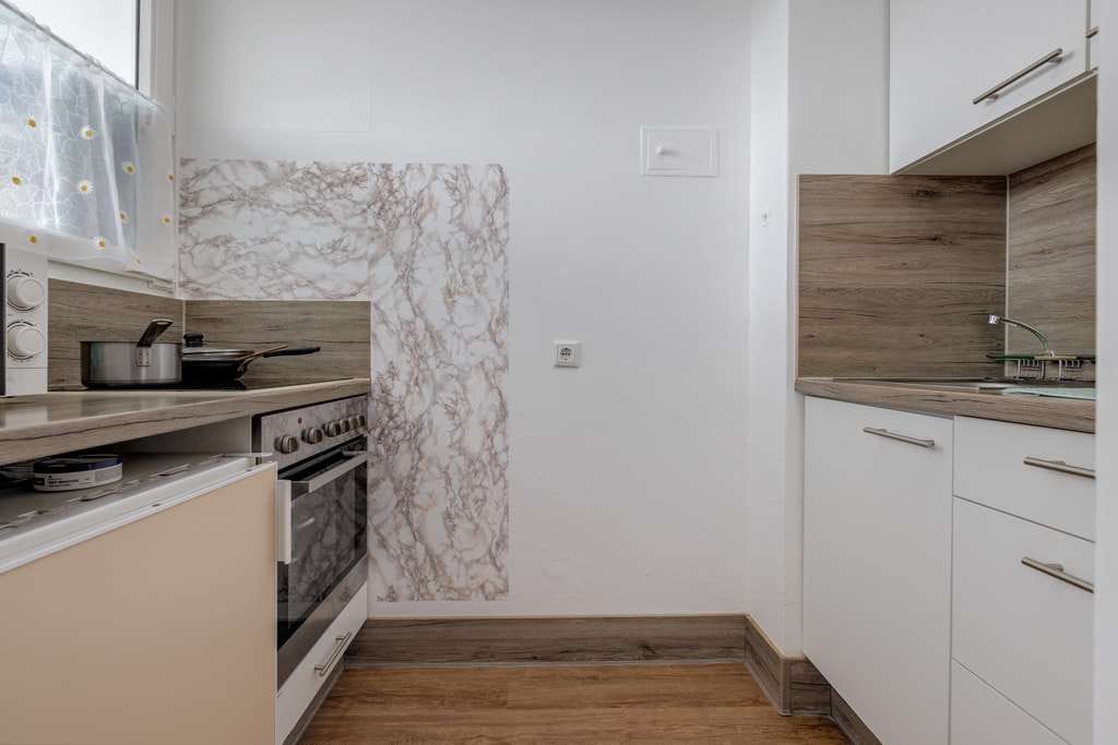 Immobilie in Frankfurt am Main - Charmante Singlewohnung mit Balkon und gemütlicher Küchennische - Bild 3