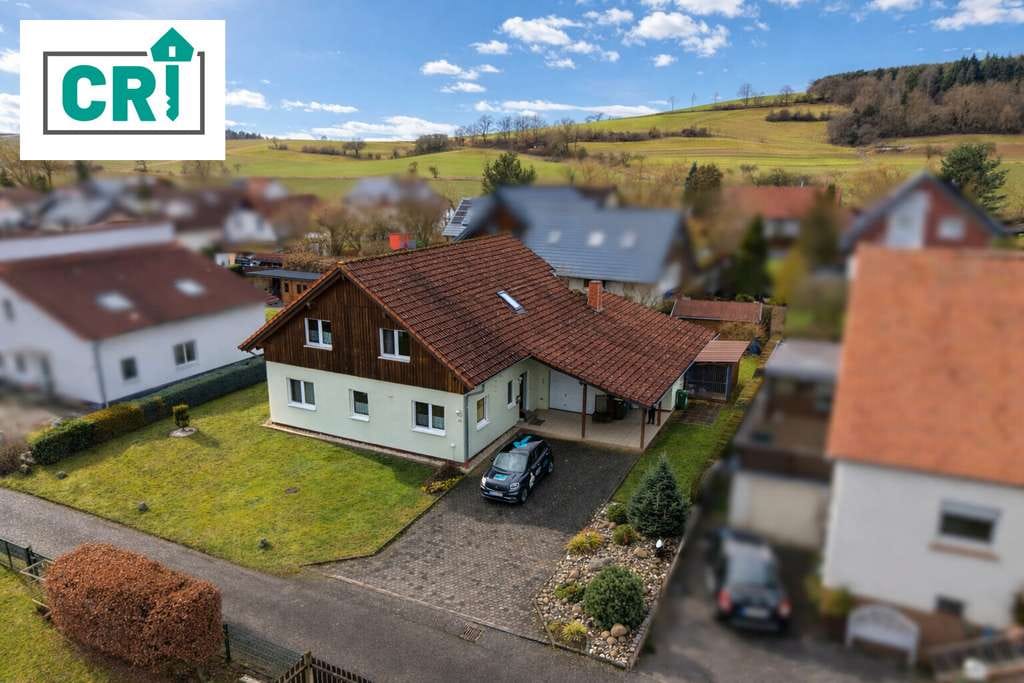 Immobilie in Wohratal - Großzügiges Einfamilienhaus mit Garten, Balkon und überdachter Terrasse in ruhiger Lage von Halsdorf - Bild 0