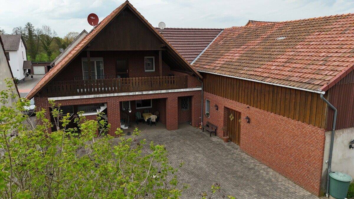Immobilie in Diepenau - Zweifamilienhaus mit vielseitig nutzbaren Nebengebäuden in 31603 Diepenau - Bild 3