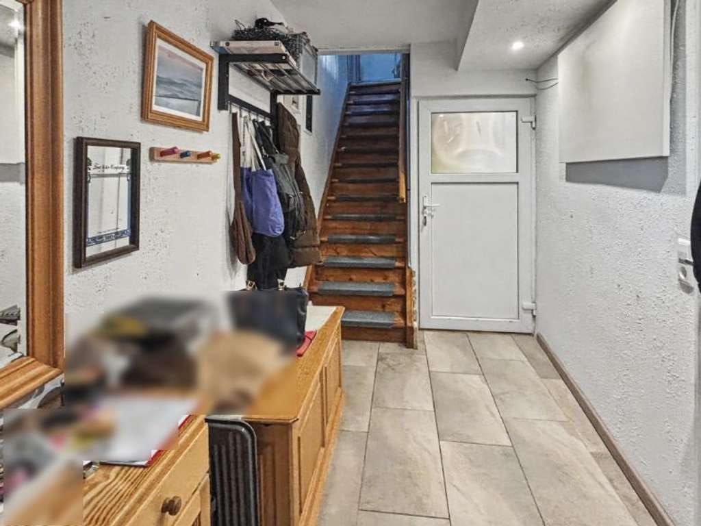 Immobilie in Ihringen - Kleines, vermietetes Reihenhaus mit großer Dachterrasse im Herzen von Ihringen - Bild 1