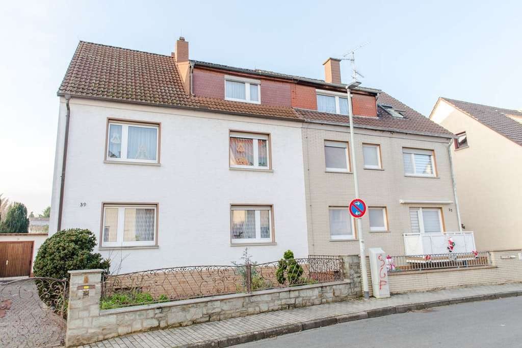 Immobilie in Flörsheim - Flörsheim: Vollvermietetes Dreifamilienhaus in angenehmer Wohnlage! - Bild 0