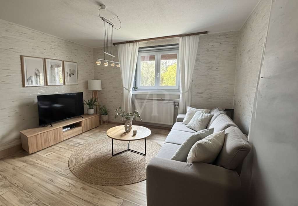 Immobilie in Mandelbachtal - Renovierungsbedürftiges Einfamilienhaus mit großen Grundstück - Bild 2