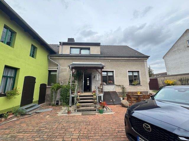 Immobilie in Sülzetal - Liebevoll gepflegtes Einfamilienhaus mit Einliegerwohnung und viel Nebengelass - Bild 1