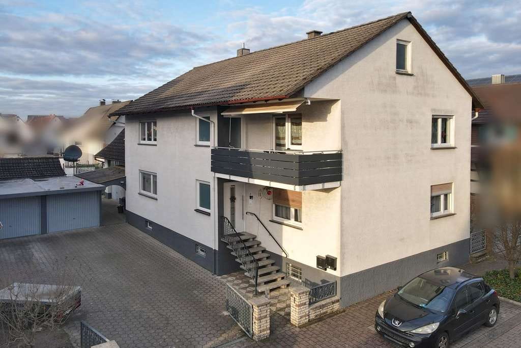 Immobilie in Muggensturm - Charmante 4-Zimmer-Wohnung mit Garten & Garage in zentraler Lage in Muggensturm - Bild 0