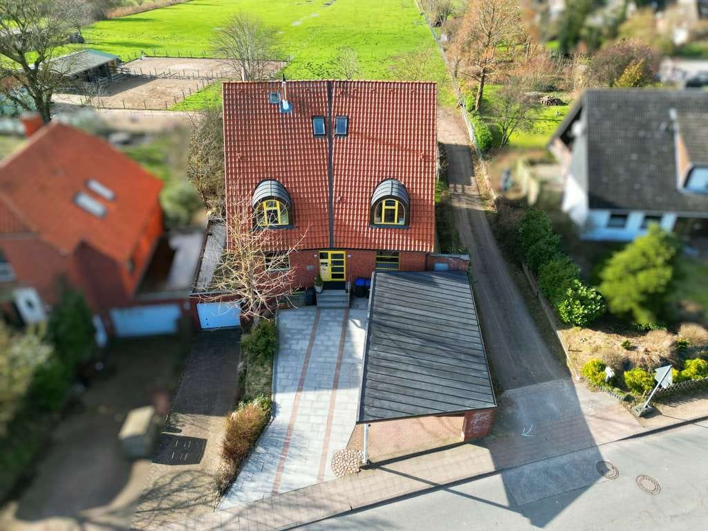 Immobilie in Süsel - Ihre sorgenfreie Zukunft! Durchgehend renoviertes Mehrfamilienhaus mit 5 WE in Ostseenähe in Süsel - Bild 2