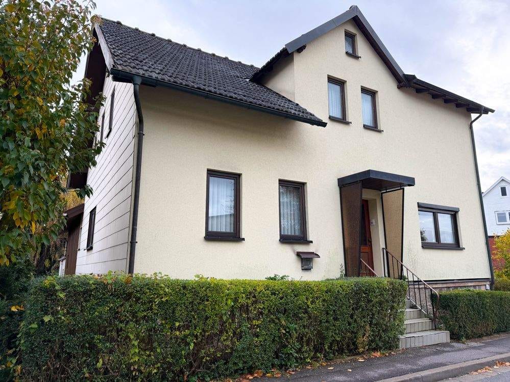 Immobilie in Neustadt bei Coburg - Eigentumswohnung mit separaten Grundstück und Ausbaupotenzial - Bild 0