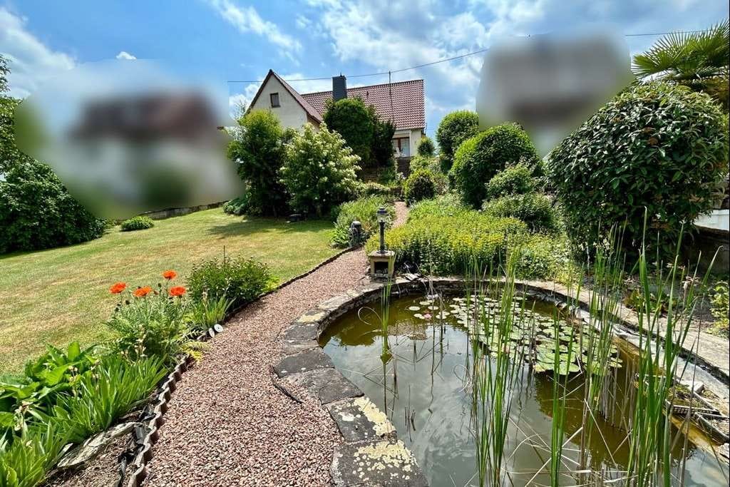 Immobilie in Hüffelsheim - Großzügiges Wohnen mit großem Garten und vielen Extras - Bild 3