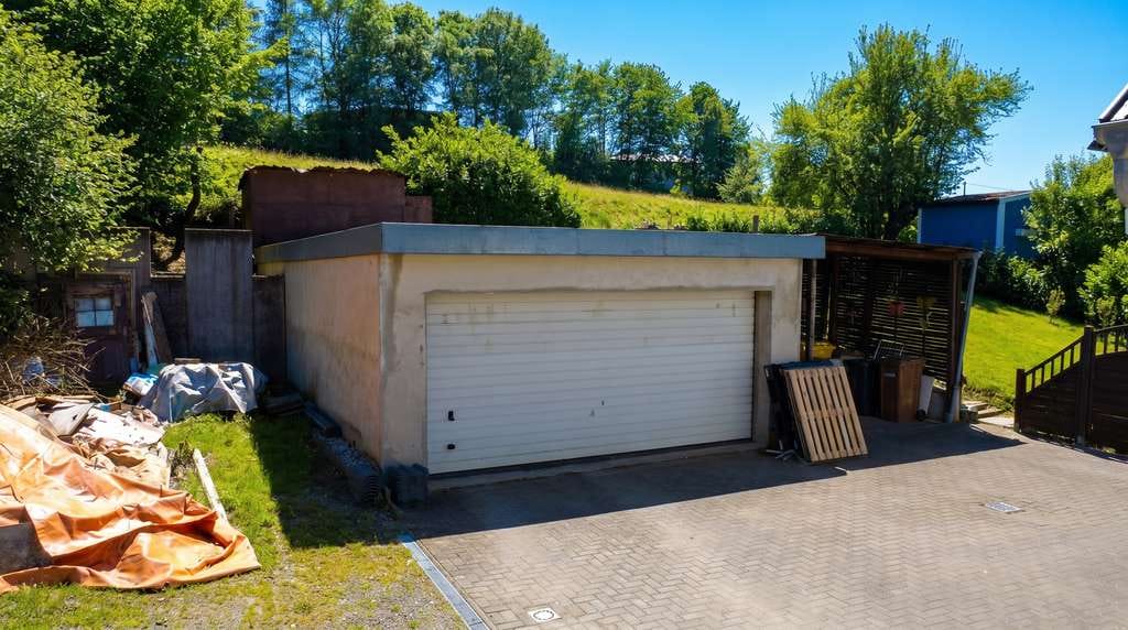 Immobilie in Kreuztal - Viel Platz für die Familie: Einfamilienhaus mit Doppelgarage und Garten - Bild 4