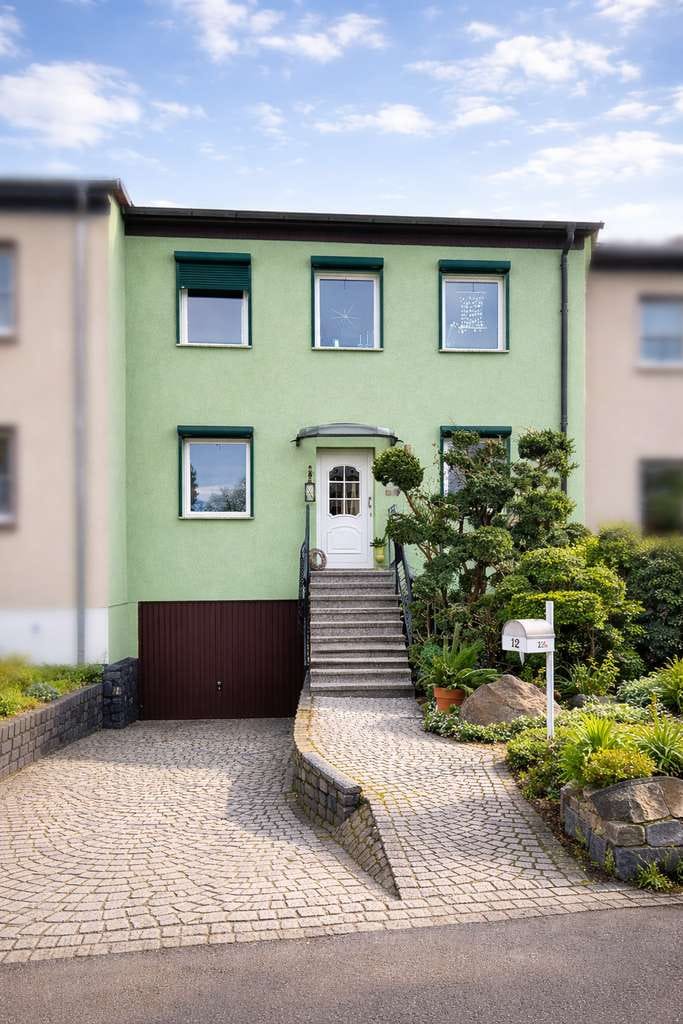Immobilie in Steinhöfel - Familienidyll mit Stil – hochwertig modernisiertes Reihenhaus mit Traumgarten in Heinersdorf - Bild 0