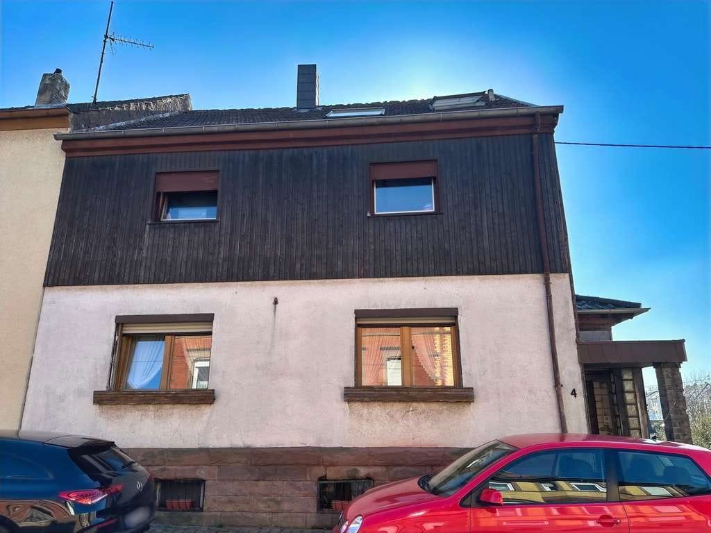 Immobilie in Merchweiler - Großzügiges Einfamilienhaus mit Potenzial - Bild 1