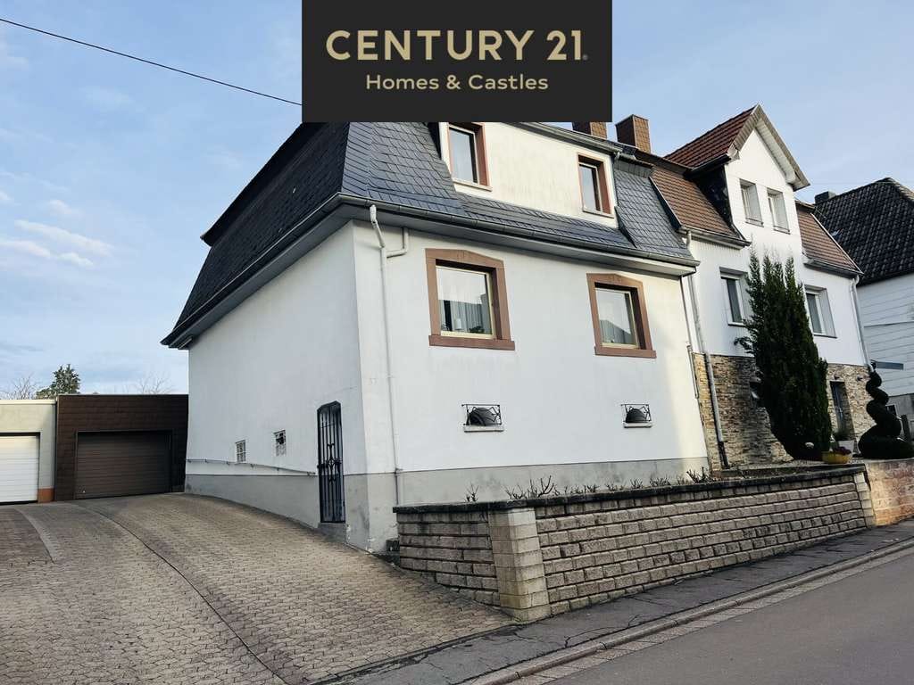 Immobilie in Heusweiler - Familienfreundliches Einfamilienhaus mit großzügigem Garten und viel Raum für Lebensqualität - Bild 0