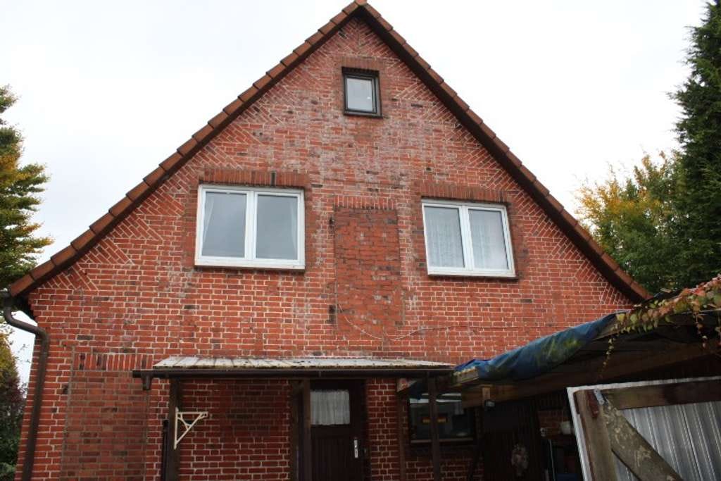 Immobilie in Rosengarten - Potenzial in Toplage: Sanierungsbedürftiges Zweifamilienhaus auf ca. 1.352 m² großem Eckgrundstück - Bild 4