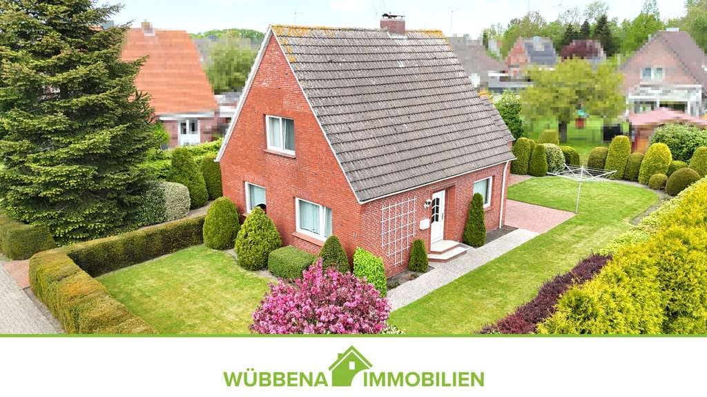 Immobilie in Hinte - Hinte! Einfamilienhaus mit Garage und Garten in familienfreundlicher Wohnlage und Nähe zur Krummhörn - Bild 1