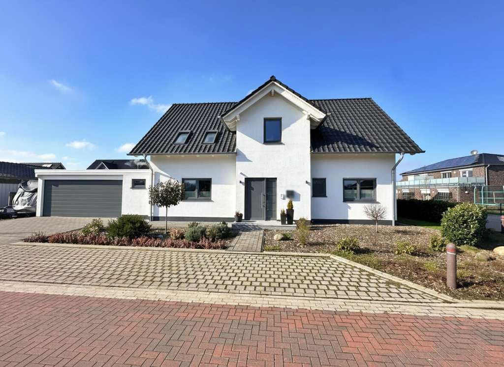 Immobilie in Dötlingen - Neuwertiges Ein-/ Zweifamilienhaus in energetischer Bauweise in Dötlingen Brettorf - Bild 2