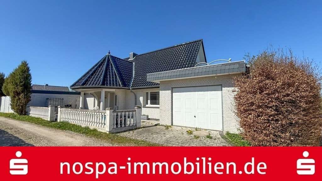 Immobilie in Mittelangeln - Wohnhaus mit südländischem Flair! Wohnhaus mit Doppelgarage, Wintergarten und Dachterrasse - Bild 0