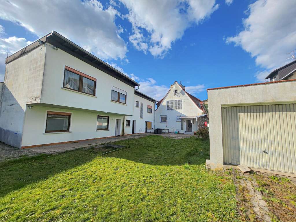 Immobilie in Eppertshausen - Vielseitiges Zweifamilienhaus mit Innenhof & Ausbaupotenzial in Epperthausen - Bild 1