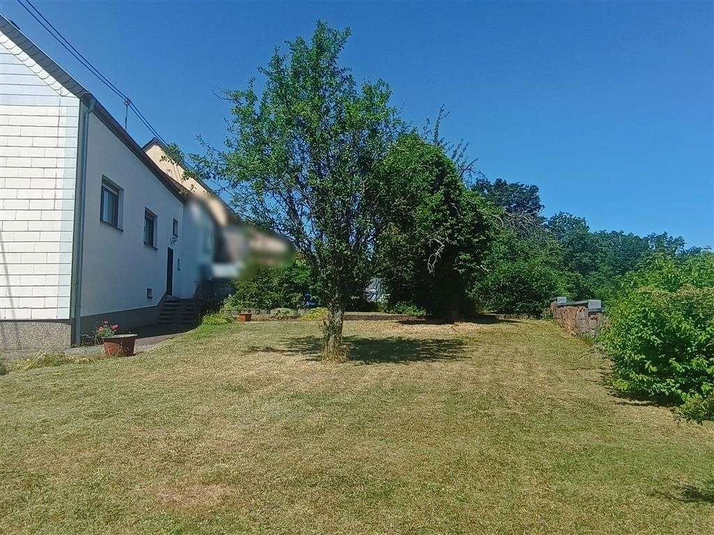 Immobilie in Merchweiler - Einseitig angebautes Einfamilienhaus mit schönem Grundstück - Bild 4