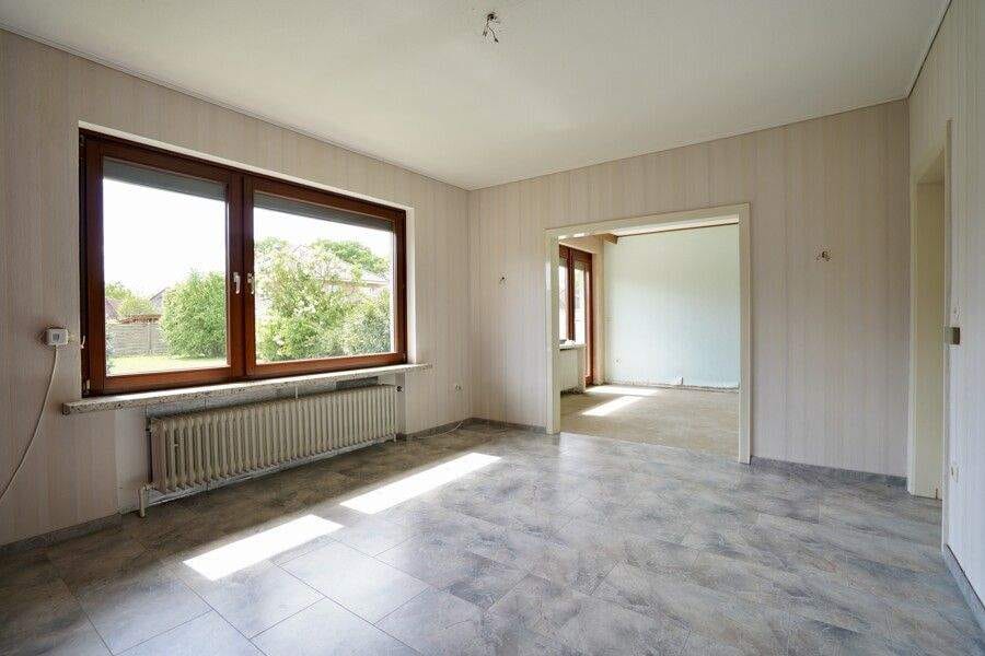 Immobilie in Scheeßel - Einfamilienhaus in ruhiger Lage mit Vollkeller, Garage und Gartenidylle - Bild 2