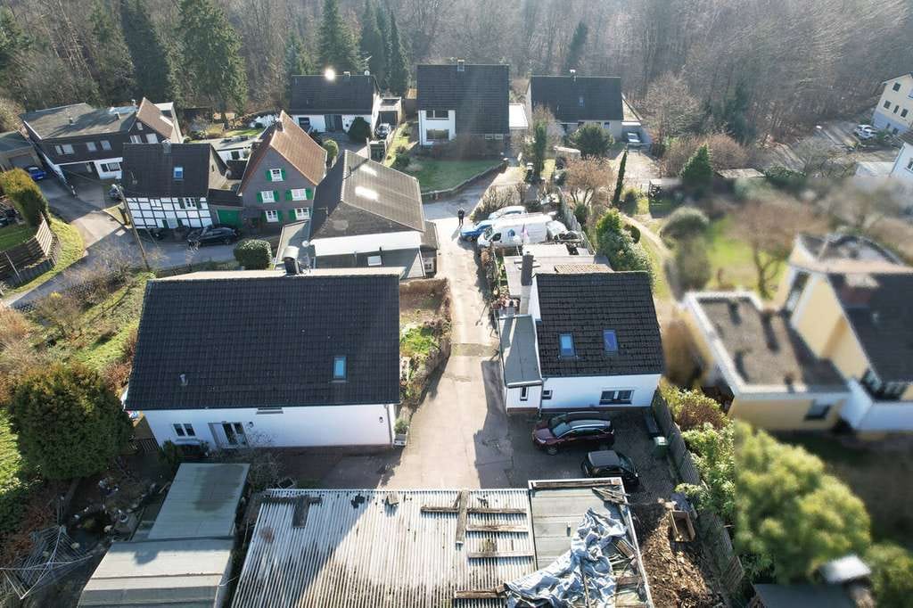 Immobilie in Burscheid - Vermietetes Gebäudeensemble mit 5 Wohneinheiten und 4 Garagen in idyllischer Randlage von Burscheid - Bild 4