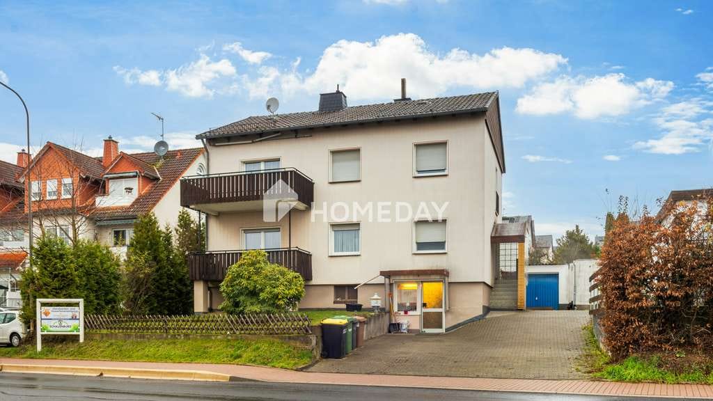 Immobilie in Schauenburg - Einfamilienhaus mit zwei Wohnbereichen, großer Garage und Büro/Gewerbefläche - Bild 2