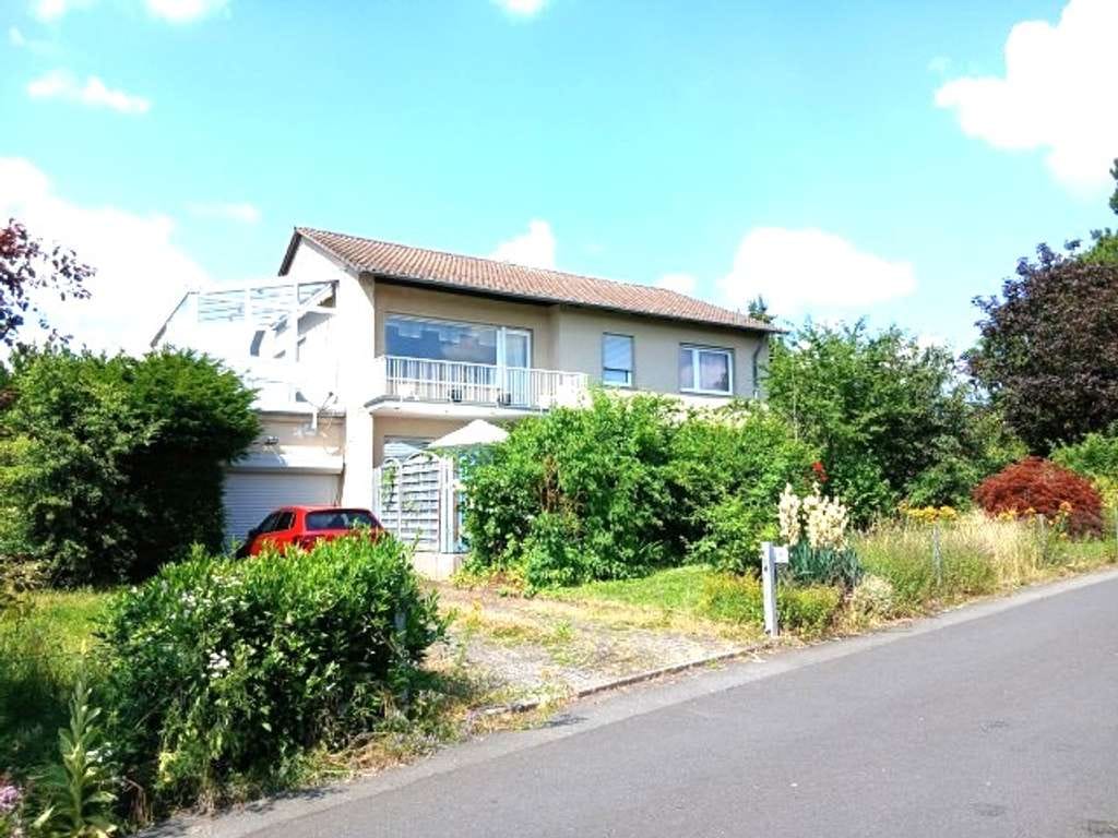 Immobilie in Ahnatal - Ahnatal-OT - Gepflegtes Zweifamilienhaus mit Grundstück - Bild 0