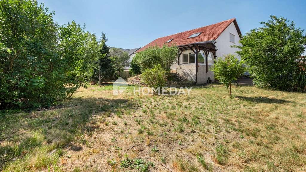 Immobilie in Forst - Ihr Familienglück in Forst: Bezugsfreies EFH mit Einliegerwohnung & Traumgarten - Bild 2