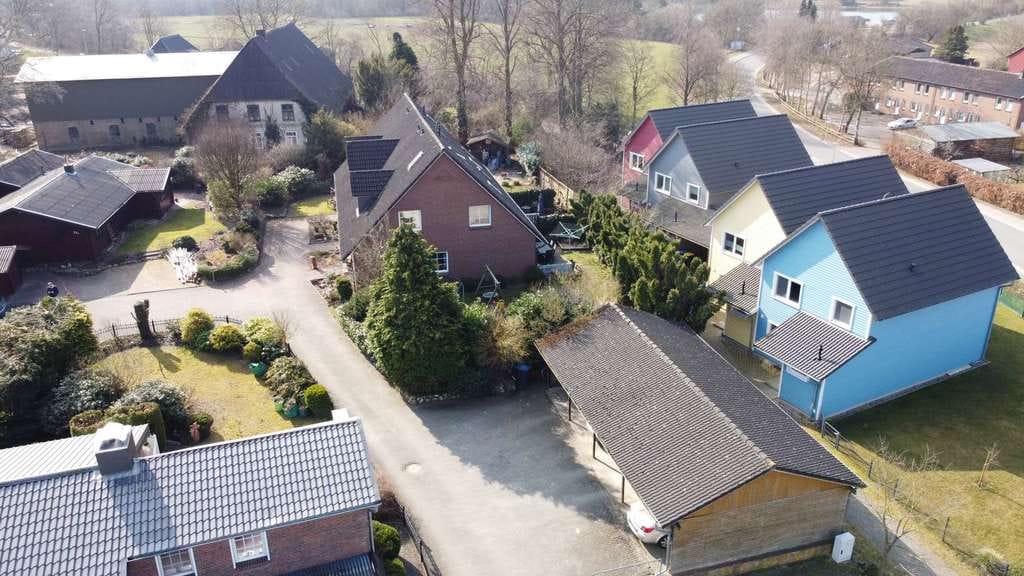 Immobilie in Brekendorf - Attraktives Reihenhaus-Ensemble in Brekendorf mit 2 REH und 1 RMH mit Vierer-Carport - Bild 3