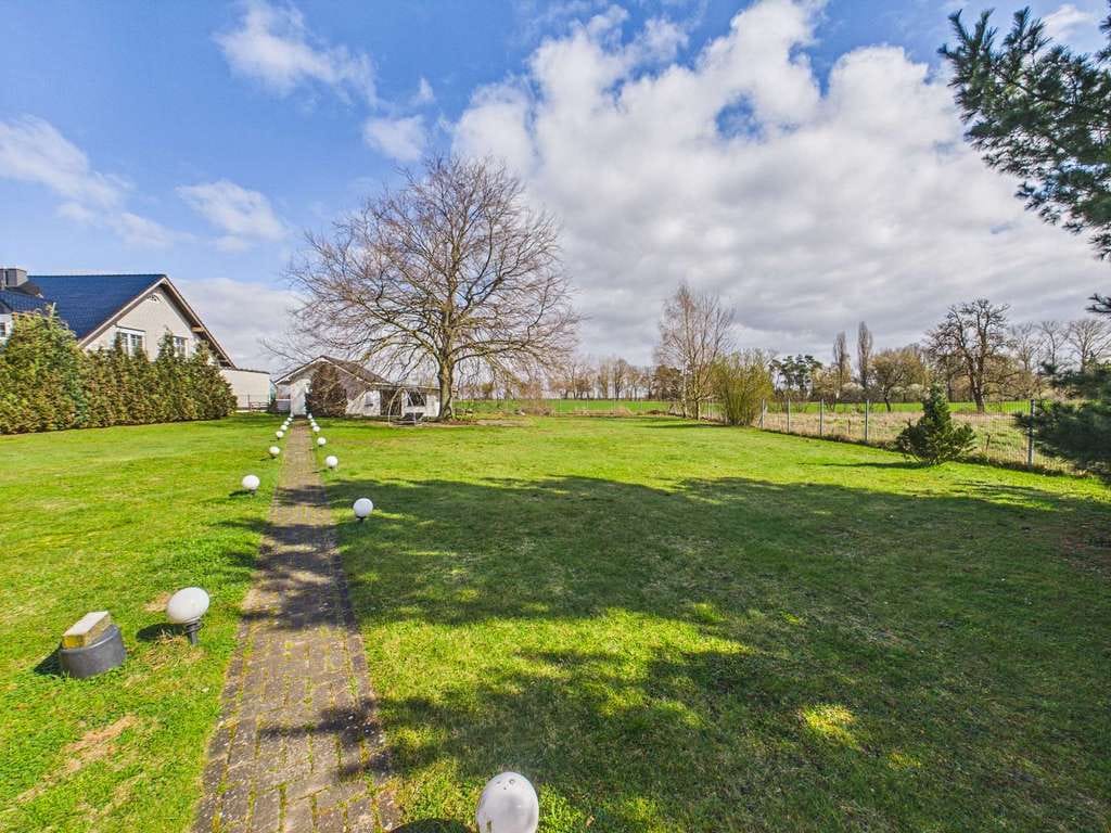 Immobilie in Oebisfelde-Weferlingen - Exklusives Wohnen auf 2.140 m² – stilvolles Familienhaus mit Studio, Kamin und Outdoor-Küche! - Bild 4