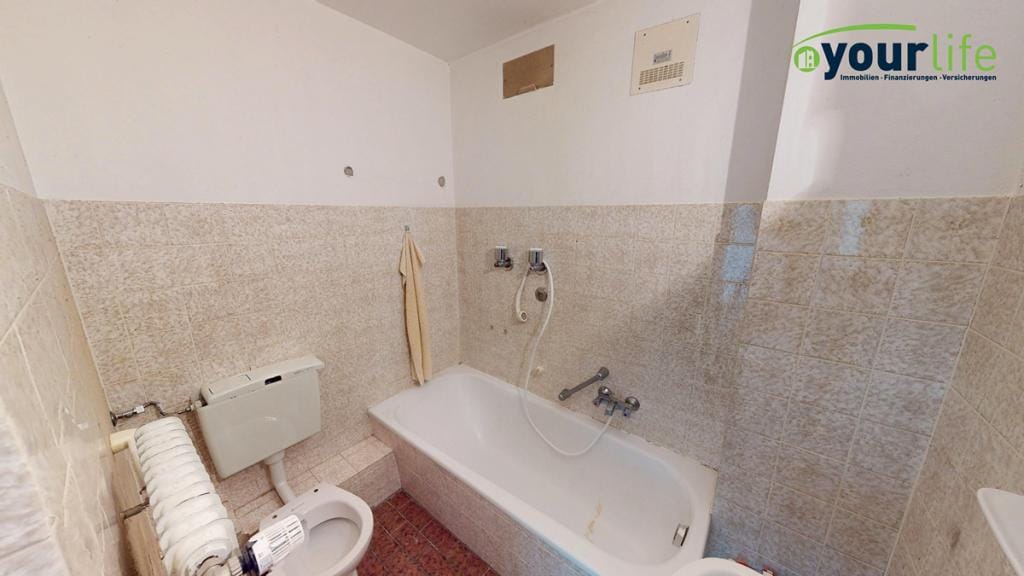 Immobilie in Memmingen - Zentrumsnahes Apartment mit Tiefgaragenstellplatz – renovierungsbedürftig - Bild 2