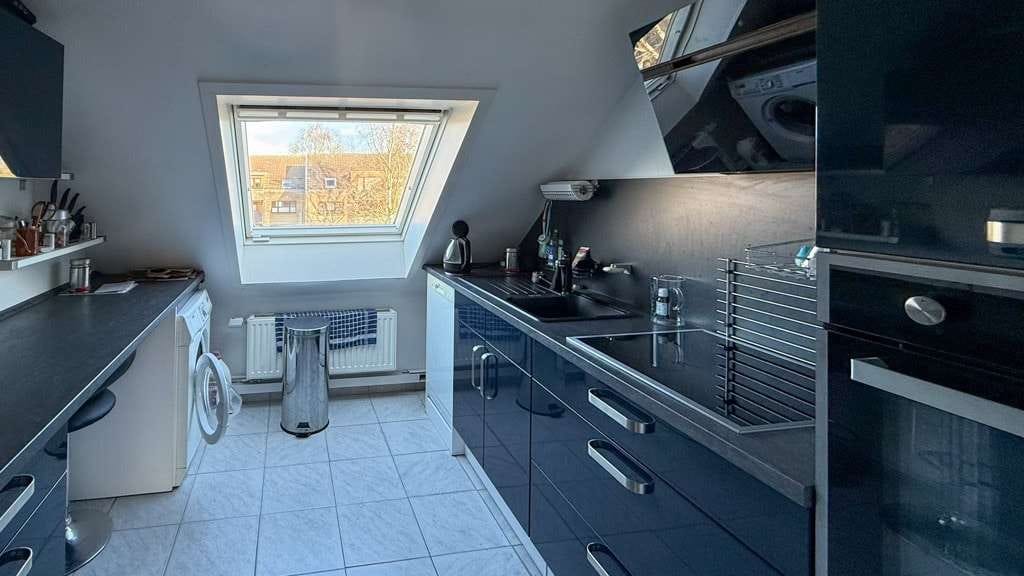 Immobilie in Glücksburg - Modernisierte, sonnige 3-Zimmer-Dachgeschosswohnung mit Balkon und PKW-Stellplatz - Bild 2