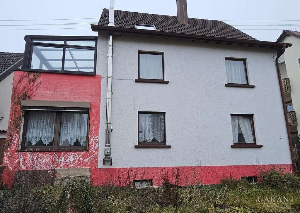 Immobilie in Steinheim am Albuch - Einfamilienhaus mit Wintergarten und viel Potential - Bild 1